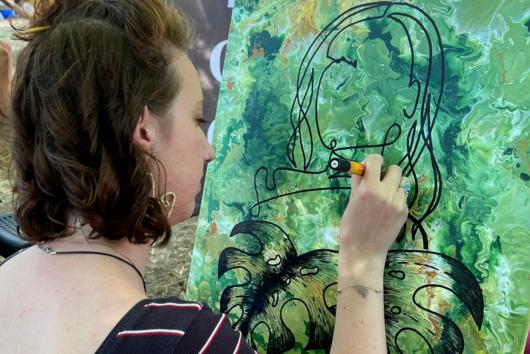LMN travaillant sur la toile Monstera